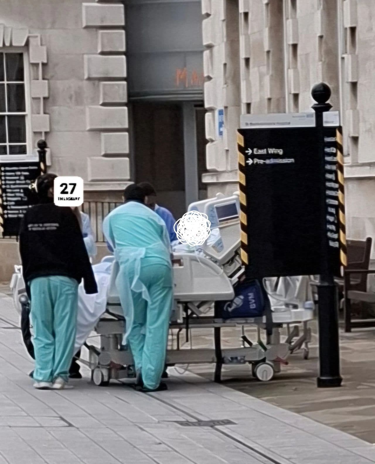 A Moment of Humanity in the Courtyard of the Hospital (I had to take a pic)